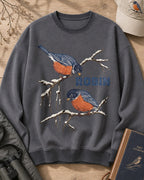 American Robin Pair Snowy Branch Winter Sweatshirt for birdwatching enthusiasts – product image 1