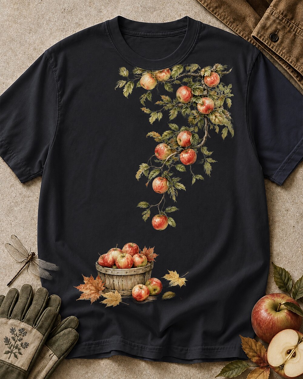 Women's black cotton T-shirt with apple branches and a harvest basket, front view.