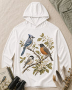 Women's white sun hoodie with a blue jay and robin on flowering branches, front view.