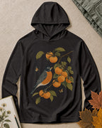 Women's black sun protection hoodie with a bluebird and orange tree print, front view.