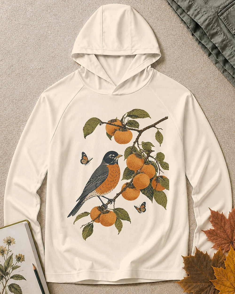 Women's white sun protection hoodie with a bluebird perched among oranges and leaves, front view.