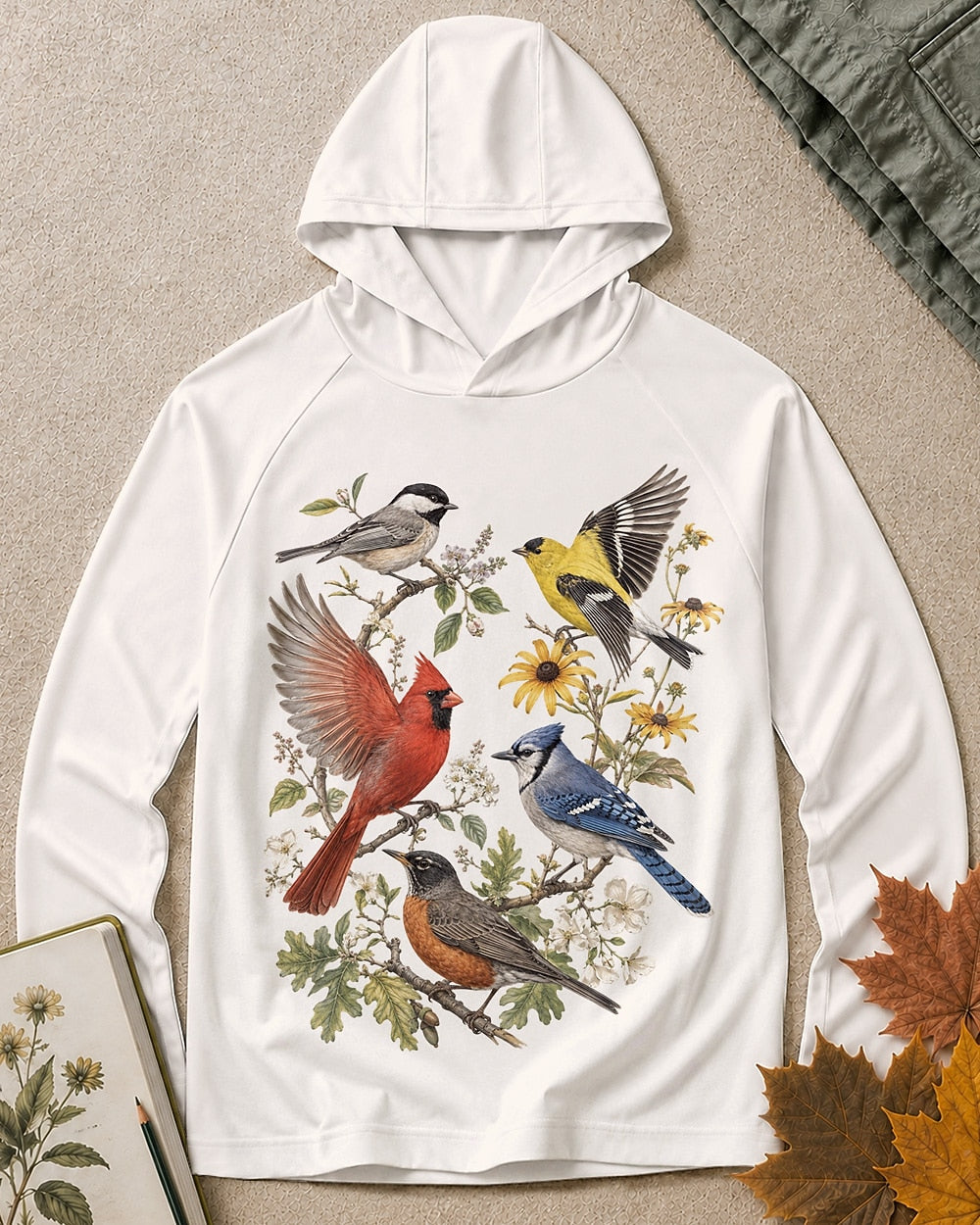 Women's white sun hoodie with cardinals, blue jays, goldfinches and flowers, front view.