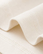 Cream fabric close-up for the women's cardinal coneflower cotton T-shirt.