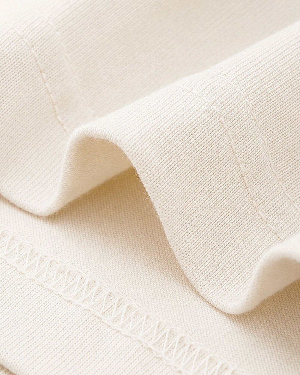 Cream fabric close-up for the women's cardinal red berries cotton T-shirt.
