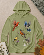 Women's green sun hoodie with cardinals, robins and other backyard birds, front view.