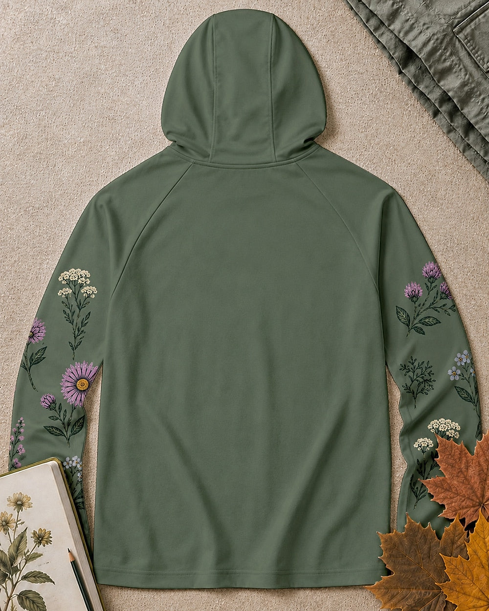 Back view of the women's green sun hoodie, showing the hood and long sleeves.