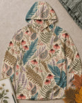 Women's blue sun hoodie with an all-over coneflower and paisley pattern, front view.