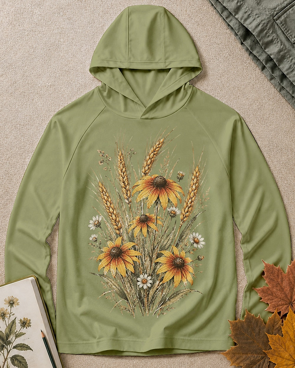 Women's green sun hoodie with a coneflower and wheat bouquet, front view.