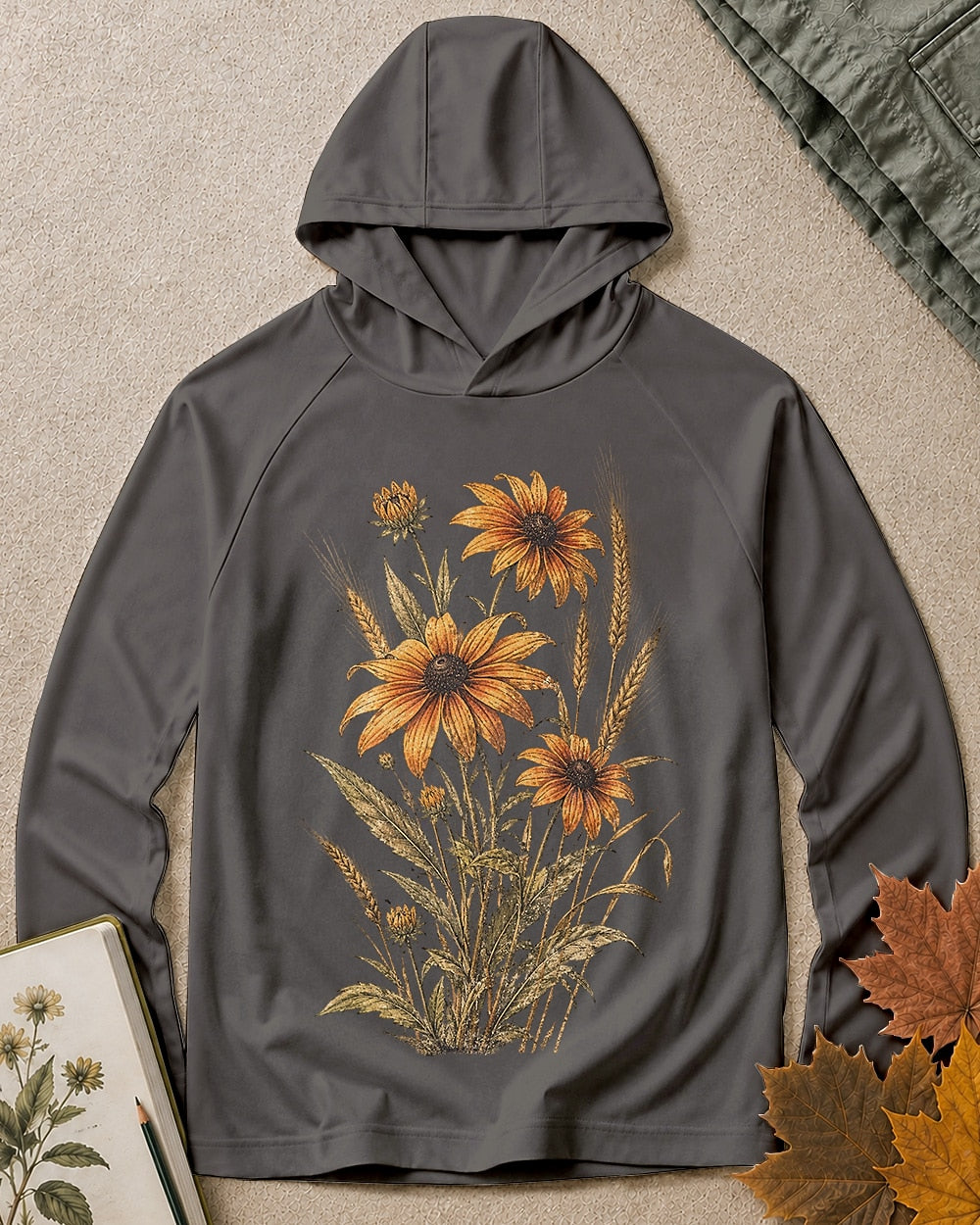 Women's dark grey sun hoodie with yellow coneflowers and wheat, front view.