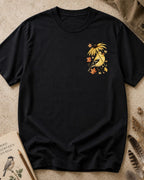Women's black cotton T-shirt with a small goldfinch and flower chest print, front view.