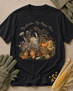 Women's black cotton T-shirt with a watering can, pumpkins and harvest flowers, front view.