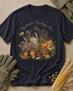 Women's dark navy cotton T-shirt with a watering can, pumpkins and harvest flowers, front view.