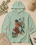 Women's green sun hoodie with a robin perched on a red berry branch, front view.