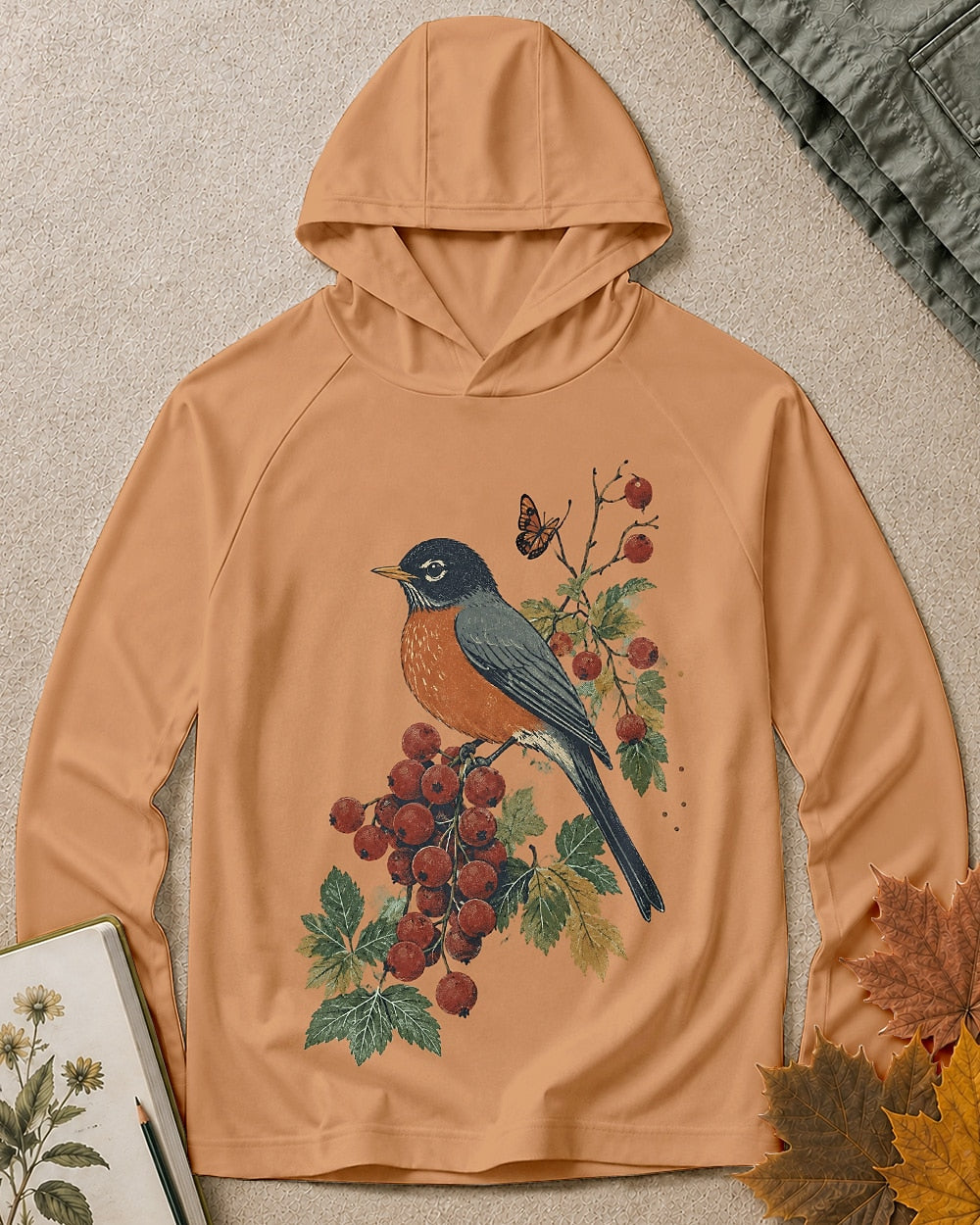Women's orange sun hoodie with a robin perched on a red berry branch, front view.