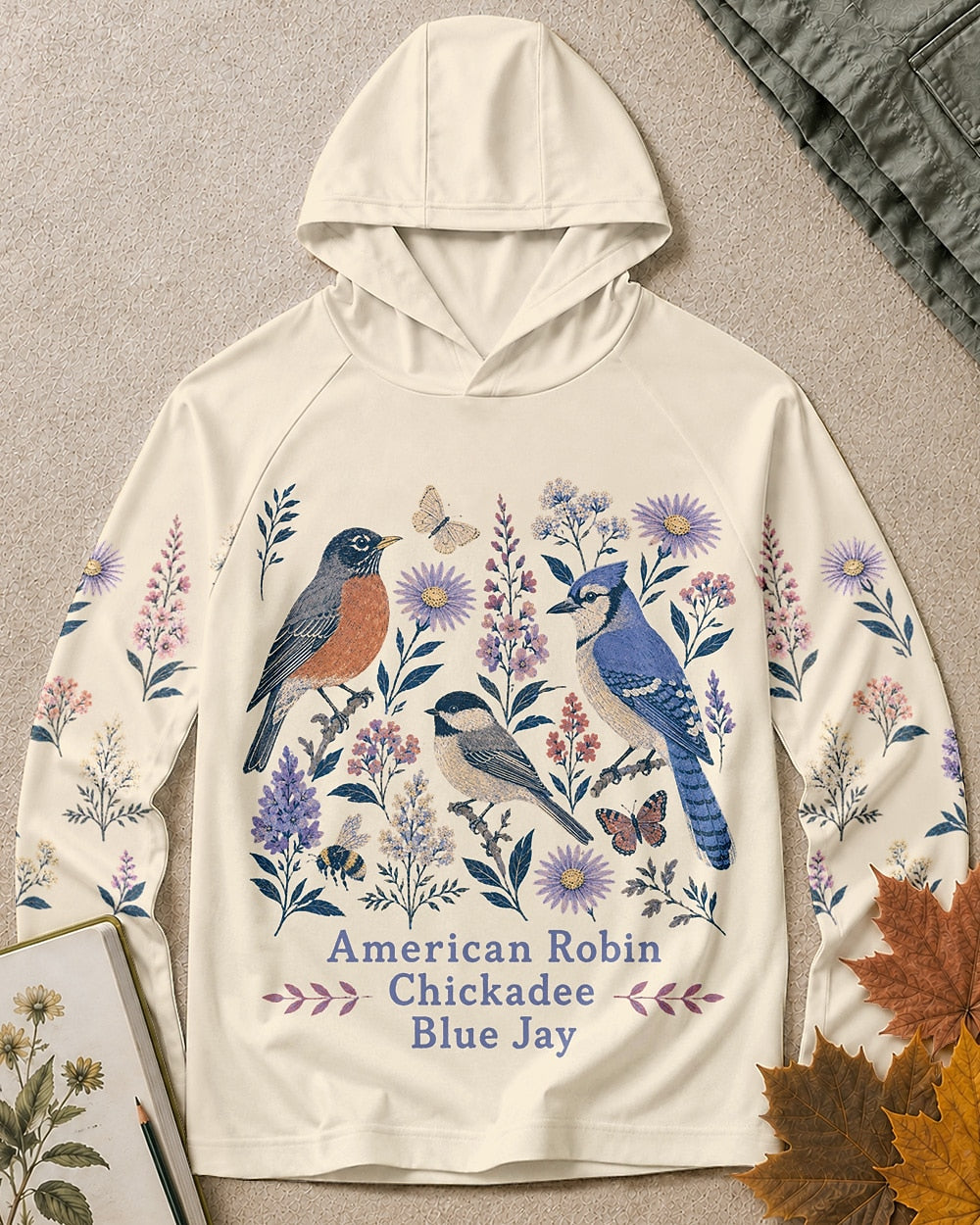 Women's white sun hoodie with robins, chickadees, blue jays and wildflowers, front view.