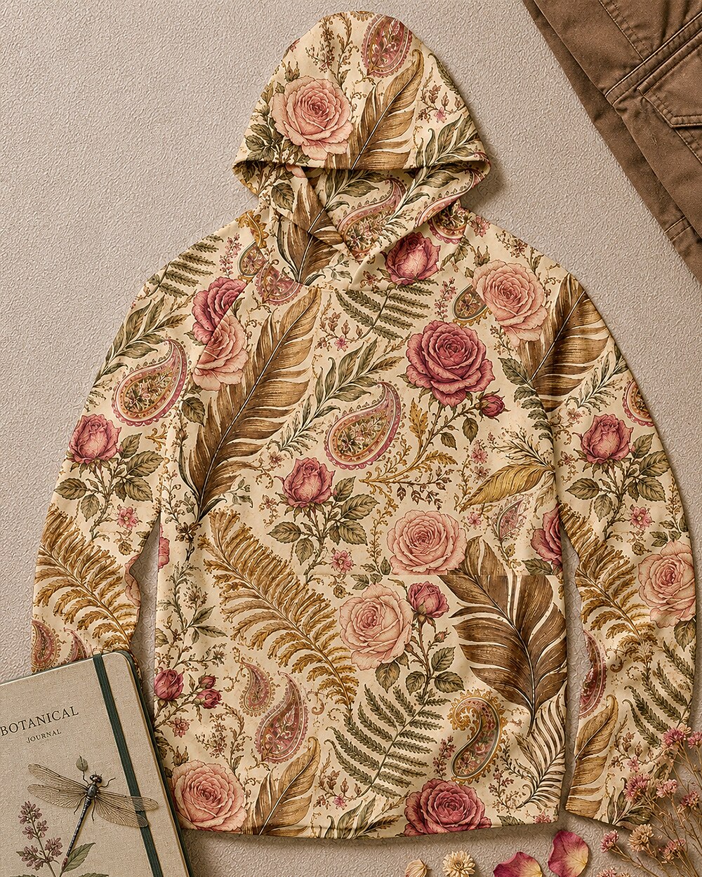 Women's yellow sun hoodie with an all-over rose and paisley pattern, front view.
