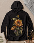 Women's black sun hoodie with sunflowers and purple asters, front view.