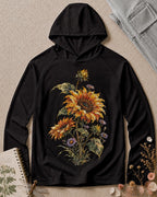 Women's black sun hoodie with sunflowers and purple asters, front view.
