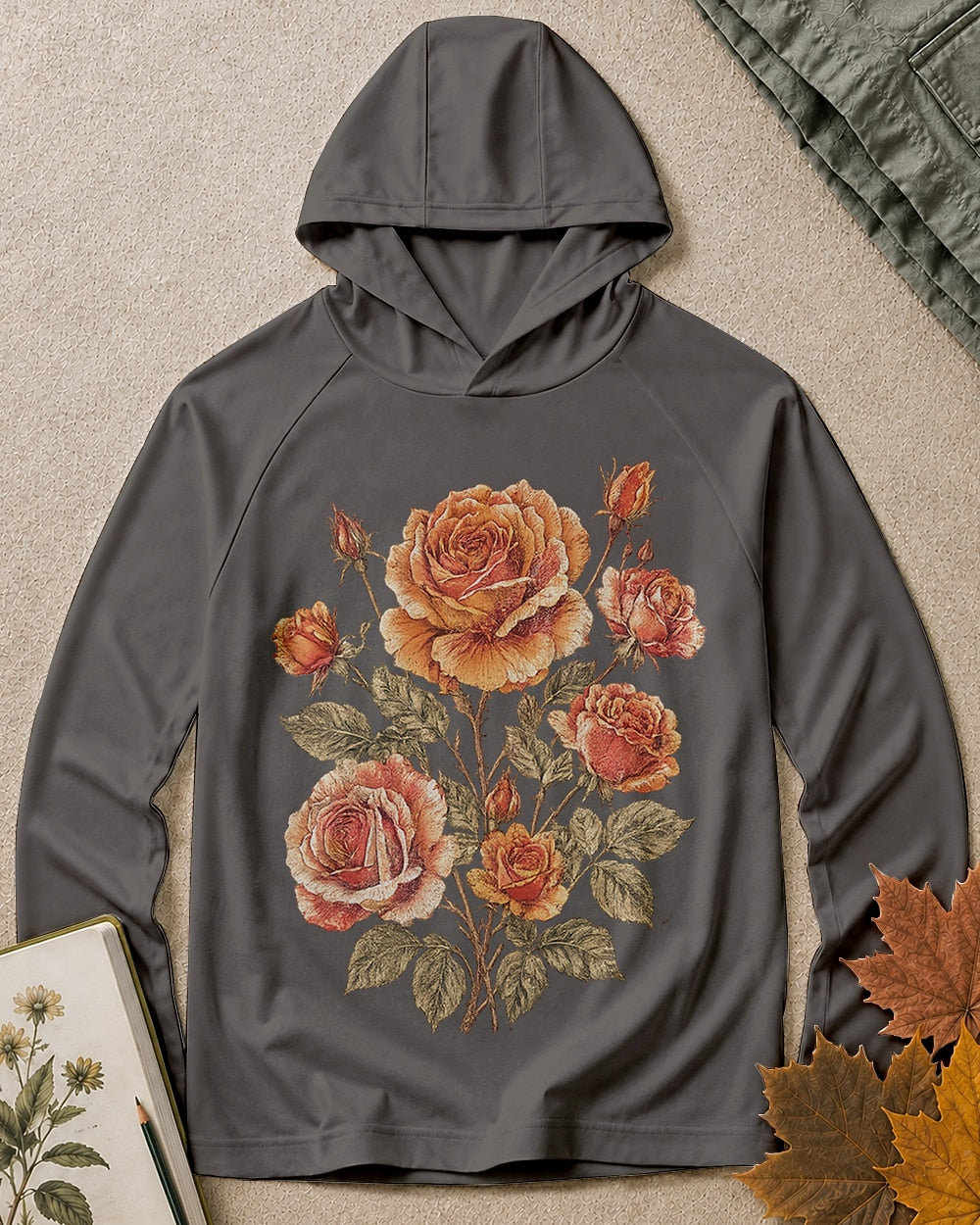 Women's dark grey sun hoodie with vintage roses and leafy stems, front view.