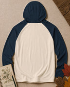 Back view of the women's navy cream sun hoodie, showing the hood and long sleeves.