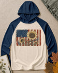 Women's navy cream sun hoodie with yellow sunflowers and an American flag, front view.